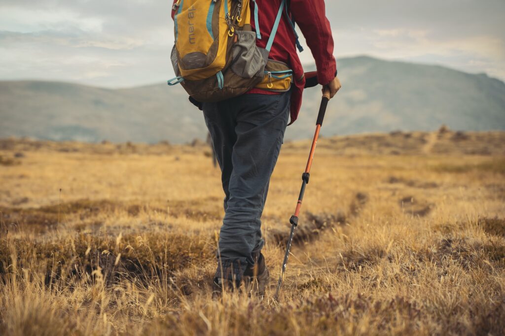 man in hiking pants on trail